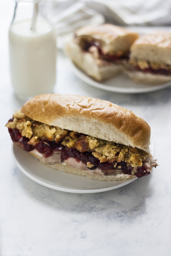 This Day After Thanksgiving Sandwich is one of my favorite recipes to enjoy leftovers! Tender turkey, sandwiched between halves of your favorite bun with tangy cranberry sauce, savory stuffing and mayonnaise. I love enjoying this for lunches or dinners around the holidays!