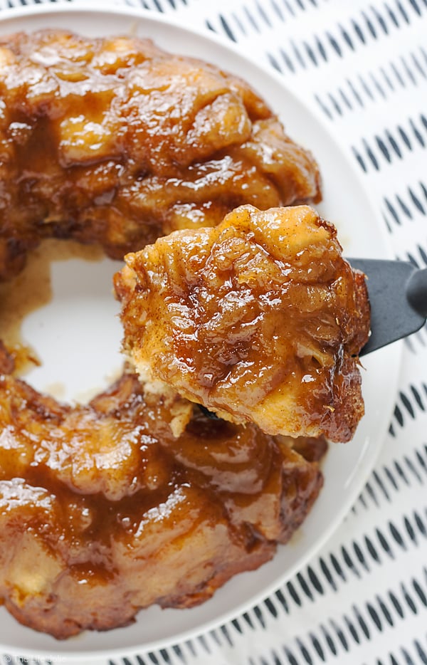 Orange Cinnamon Roll Monkey Bread is an easy and delicious twist on a family favorite recipe. Made with Pillsbury Orange Cinnamon Rolls, orange just and zest, butter and sugar, this pull apart bread can totally be made ahead and is perfect to enjoy at brunch or any family gathering!