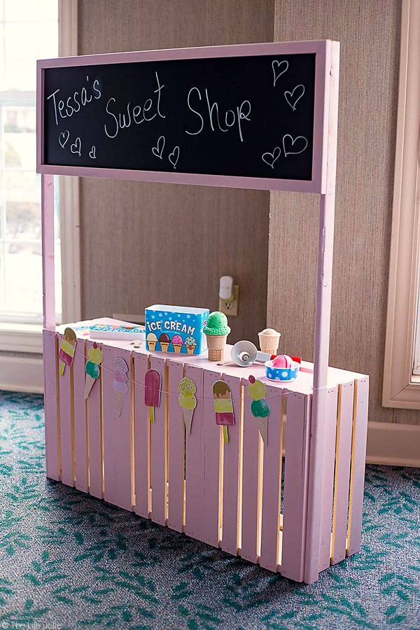 This DIY Play Stand is an imaginative toy to keep your kids entertained! It can be a lemonade stand, an ice cream stand, a market- the possibilities are endless! Your kids will have hours of fun with this easy to make and inexpensive project!