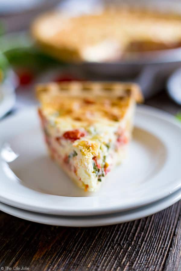 Caprese Quiche is an easy breakfast or brunch recipe. This is simple, feel-good food at it's finest with mouthwatering tomatoes, mozzarella and basil. It's great to make ahead or eat right away and perfect to whip up for Easter, Mother's Day or Christmas Morning!