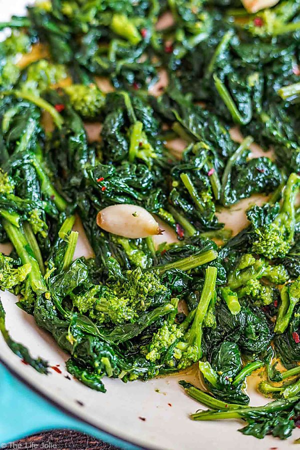 An overhead shot of a portion of a pan full of Broccoli Rabe with Garlic.