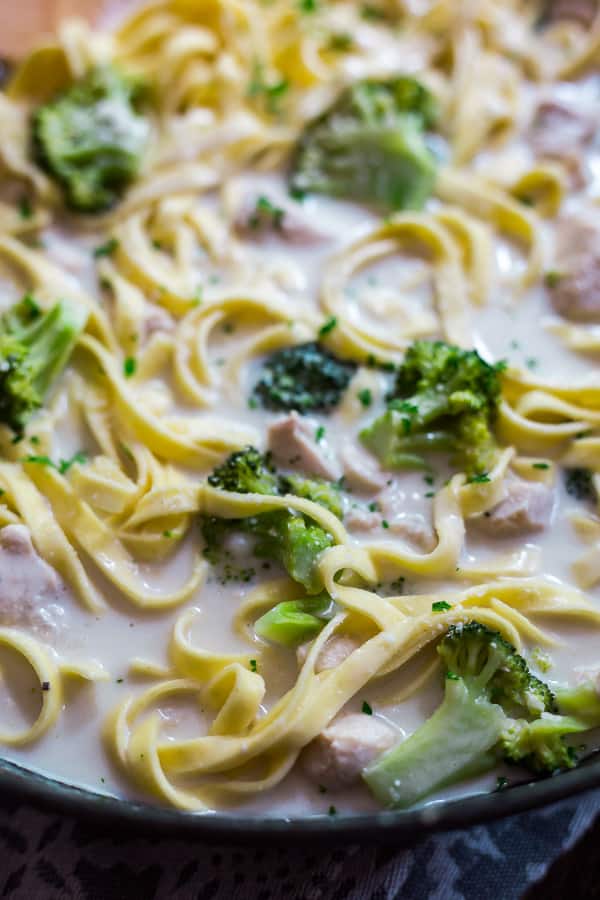 A close up image of the Creamy Chicken and Broccoli Pasta in a pan.