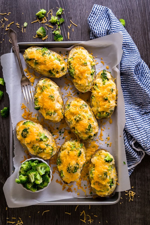 An overhead shot of a pan of Cheddar and Broccoli Twice Baked Potatoes