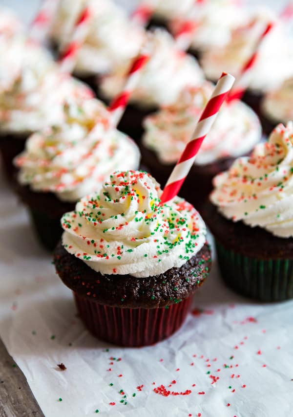 Peppermint Hot Chocolate Cupcakes with straws in them.